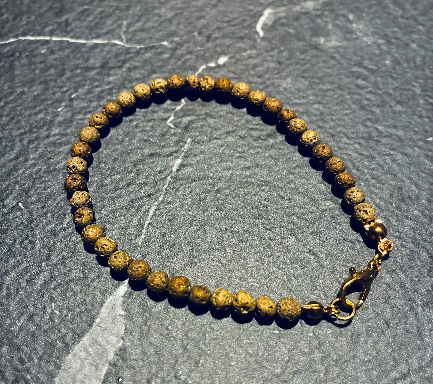 Gold Electroplated Lava Stone